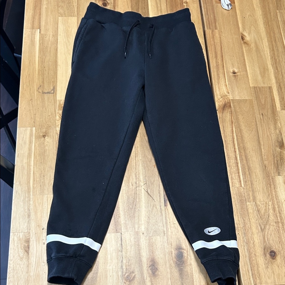 Nike Kids Black Sweatpants with White Stripes